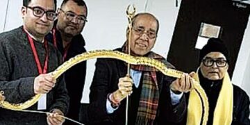 Presented a gold studded bow and arrow