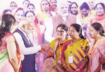 Women should play drums and plates to increase voting: Modi