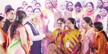 Women should play drums and plates to increase voting: Modi
